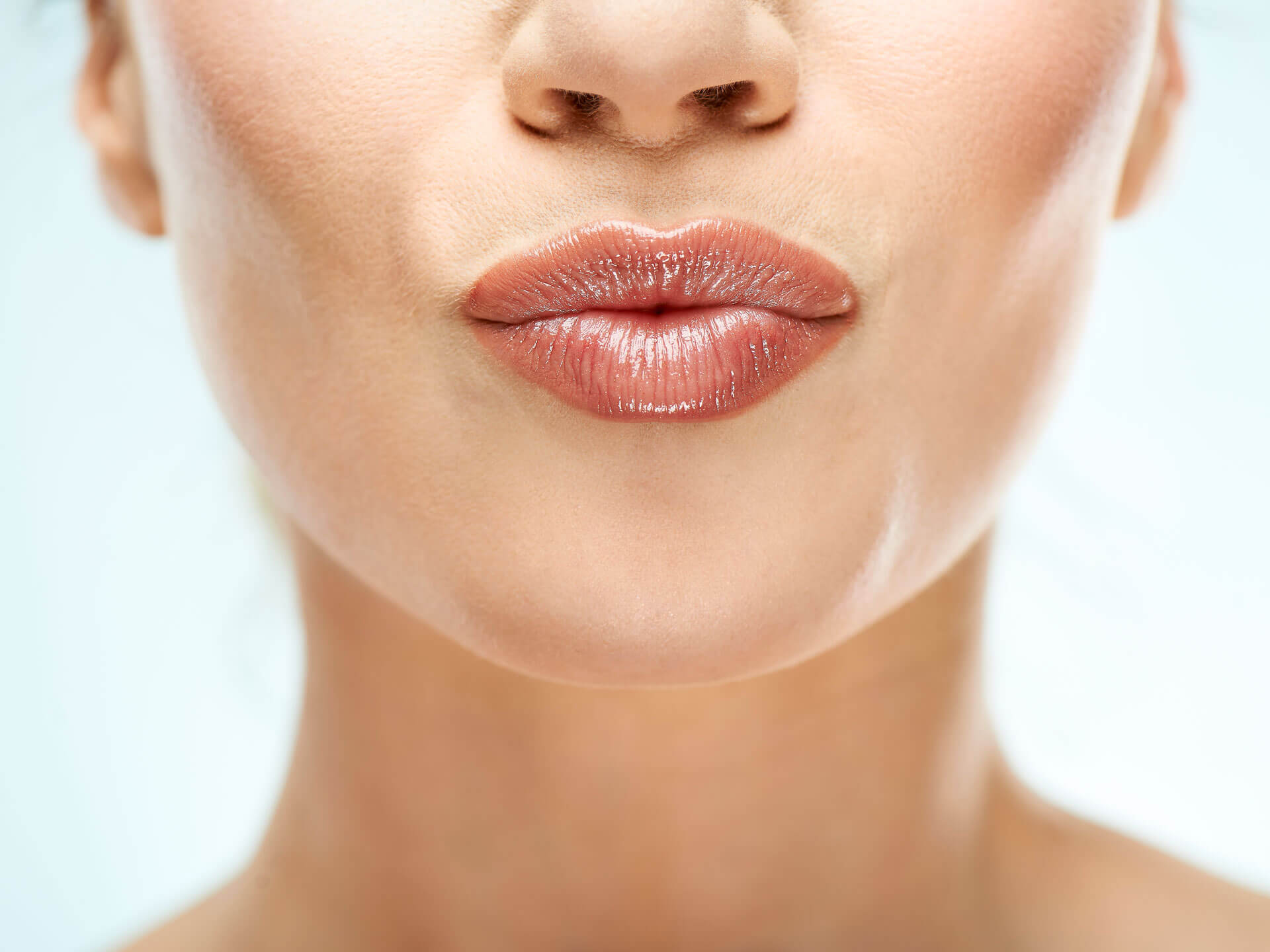 A close up of a woman's plump lips